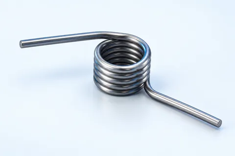 Helical torsion spring with two straight legs extending in different directions.